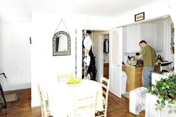 Livingroomlooking into kitchen, bathroom and closet